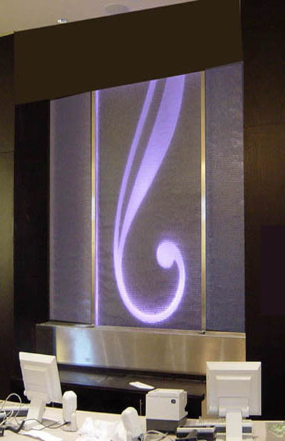 The view of a water wall with a curve design